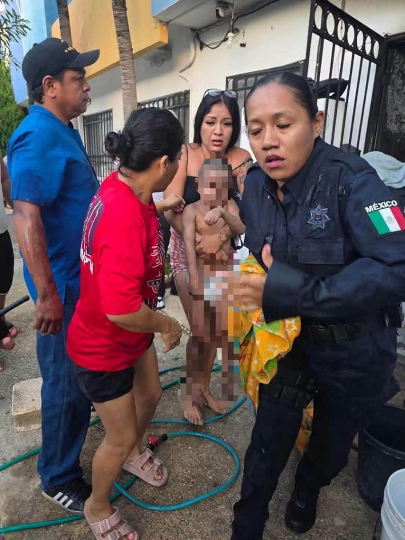 Policía rescata a menores durante incendio en Cancún